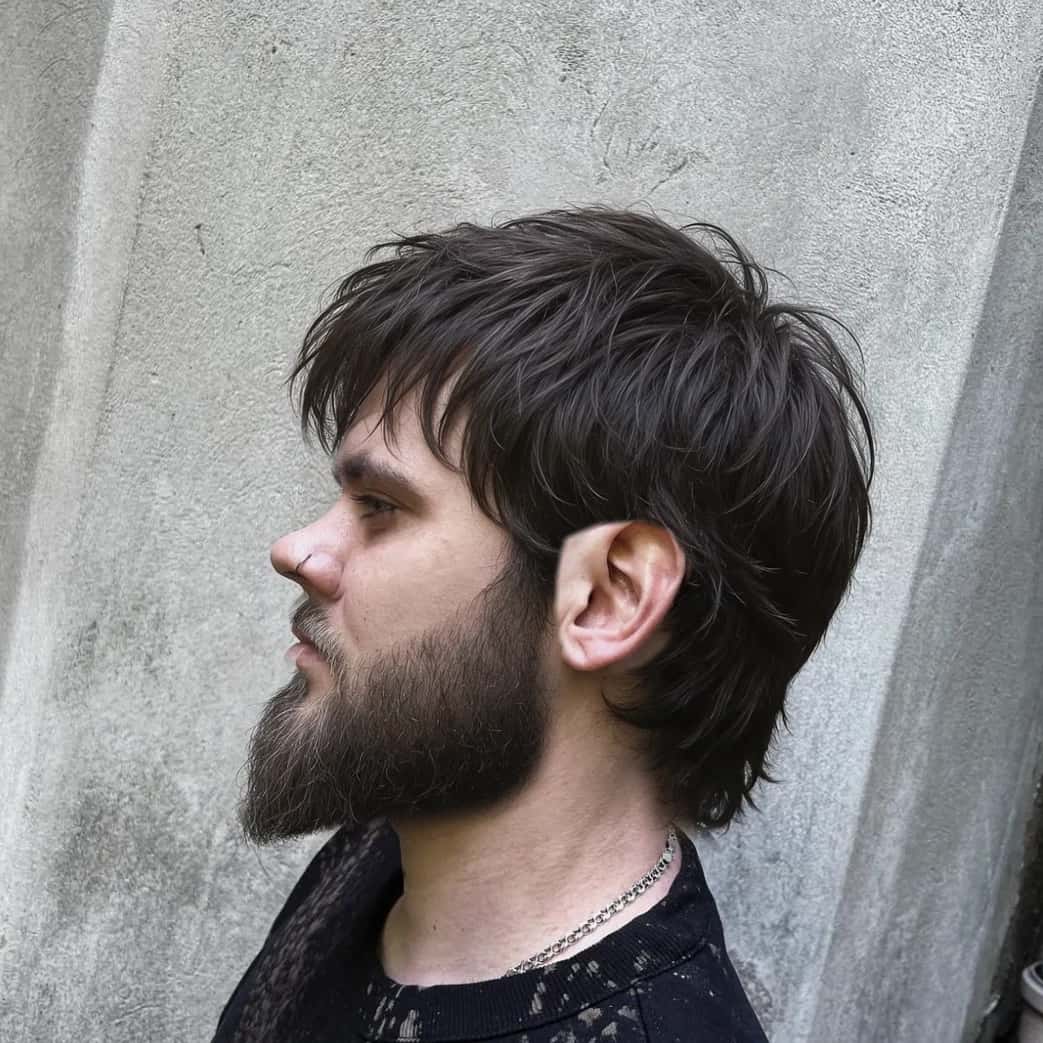 The same client before the cut: grown-out hair and beard